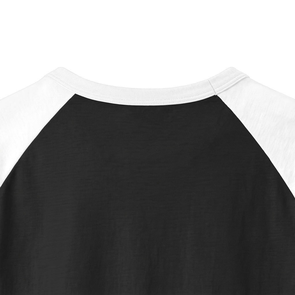 Close-up of the neckline of a black and white long-sleeve raglan shirt made from soft cotton fabric, featuring a ribbed collar for comfort.
