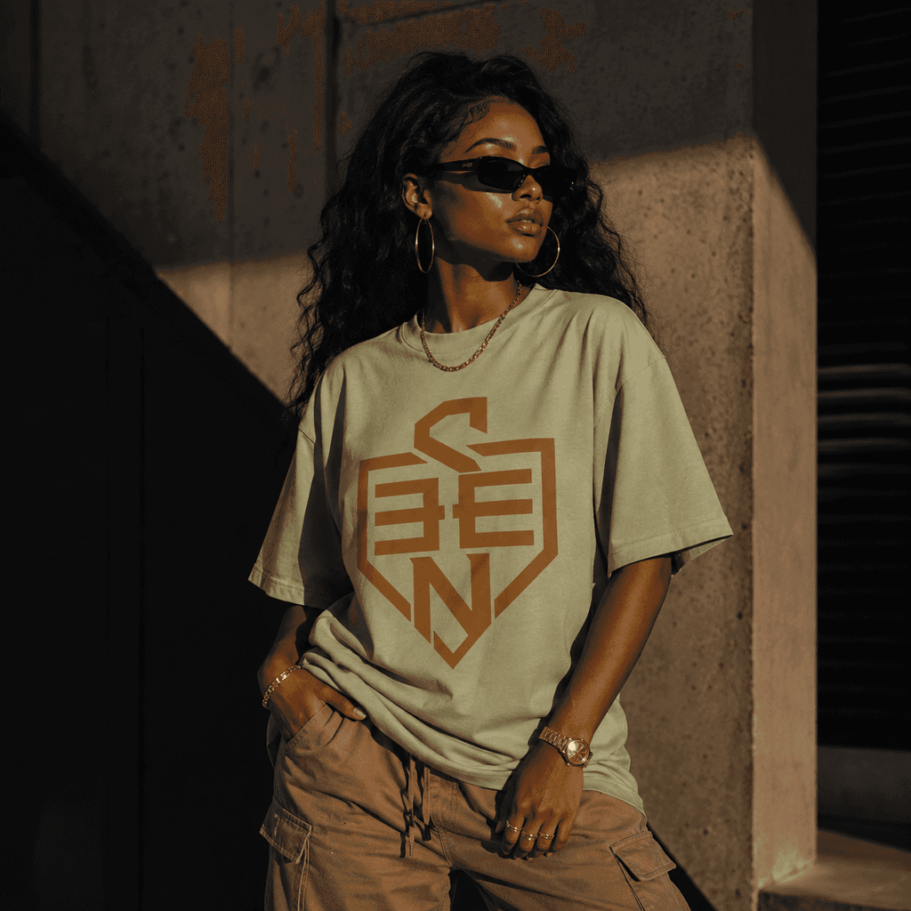 SEEN Shield Logo Tee — Gold Emblem Graphic T-Shirt