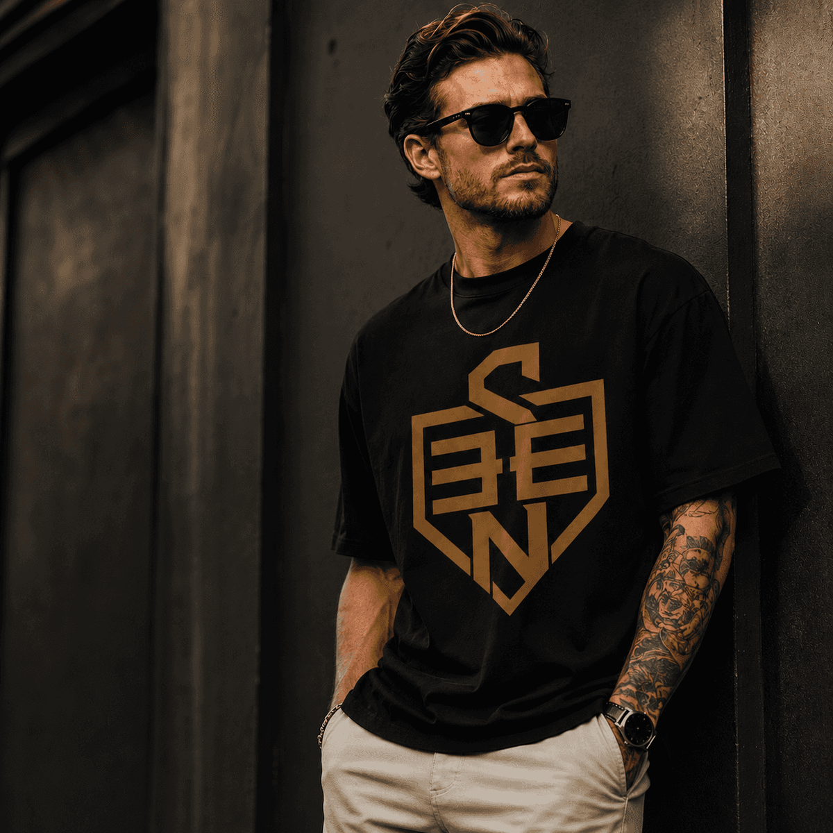 SEEN Shield Logo Tee — Gold Emblem Graphic T-Shirt