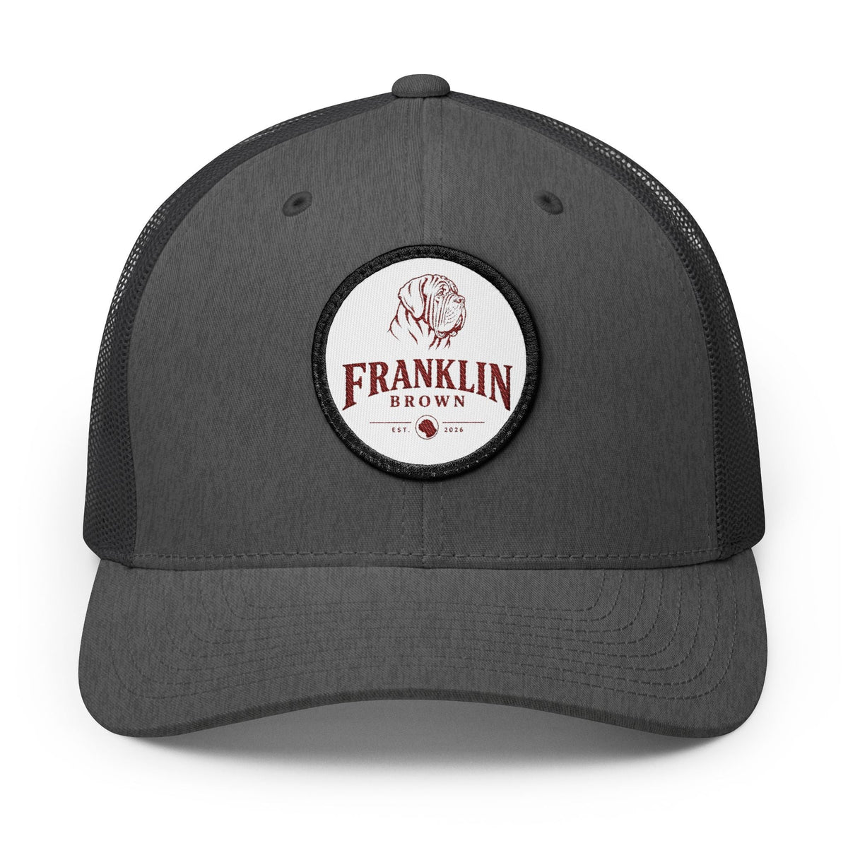 Gray mesh trucker cap with adjustable snapback closure and small top button, stylish headwear for casual wear