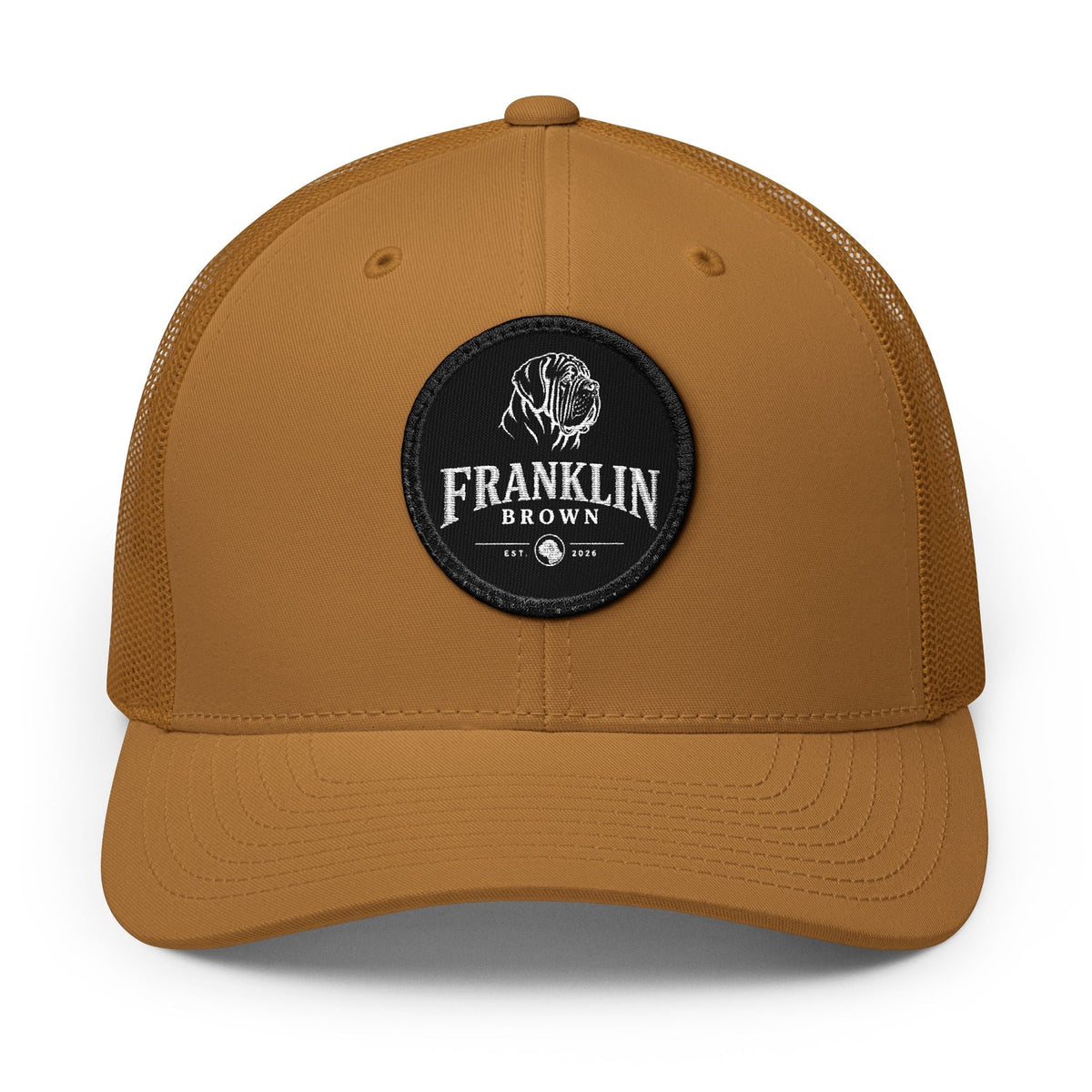 Burgundy trucker cap with mesh back, embroidered lion logo on front, adjustable snapback closure, and curved brim