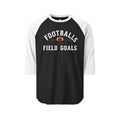 Black and white long-sleeve raglan shirt with football graphic and 'Football Field Goals' text, made from cotton, versatile sportswear for men and women.
